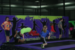 Many Kids at Trampoline Park Stunt Airbag Attraction